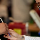 A nurse prepares a dose of the Pfizer-BioNTech vaccine against COVID-19 at the vaccination center set up at the Campo Marte, Mexico City on April 12, 2021. (Photo by ALFREDO ESTRELLA / AFP)