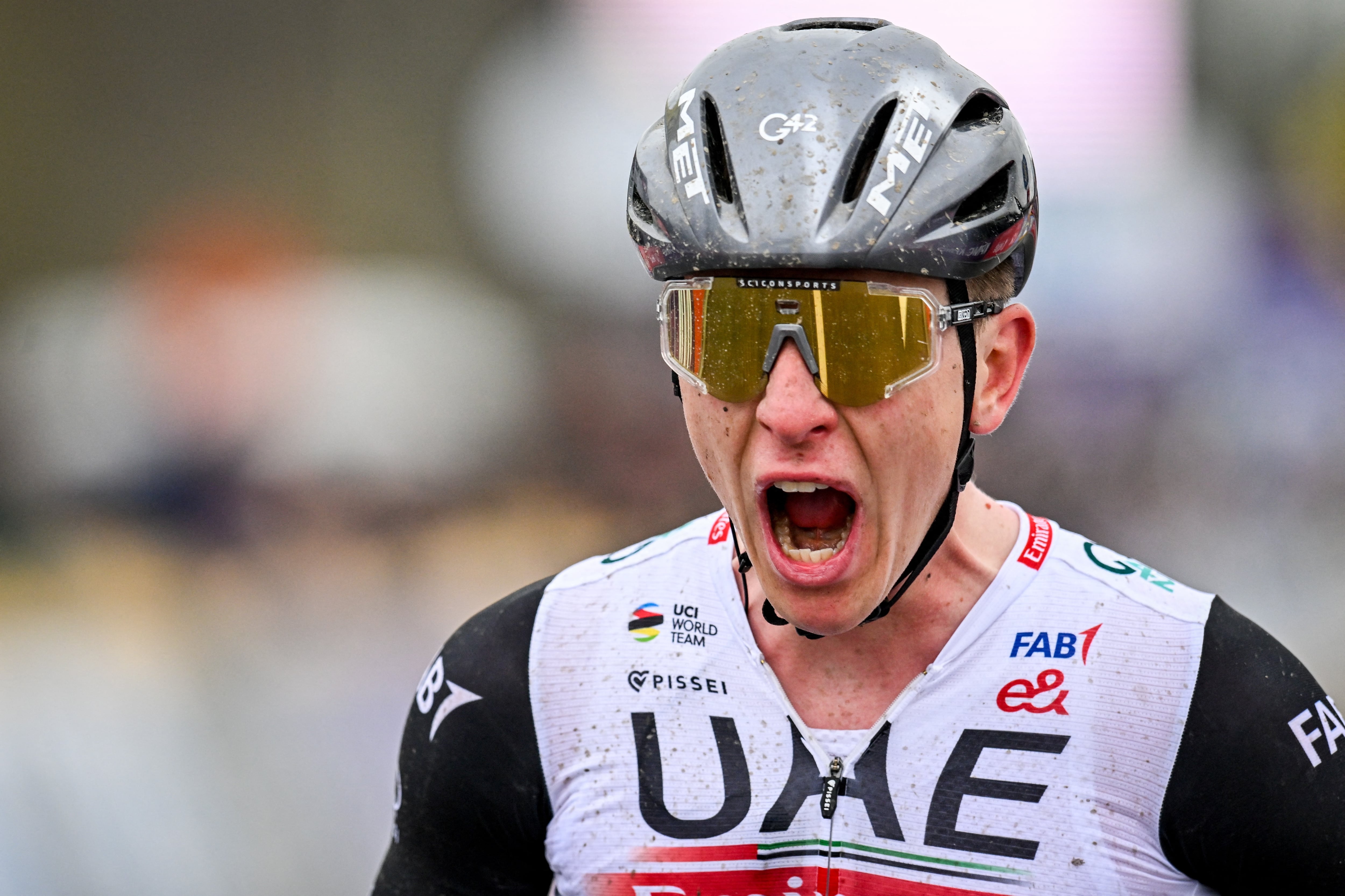 Slovenian Tadej Pogacar of UAE Team Emirates celebrates after winning the men's Tour of Flanders one day cycling event, 273,4km from Bruges to Oudenaarde, on April 2, 2023. (Photo by ERIC LALMAND / Belga / AFP) / Belgium OUT