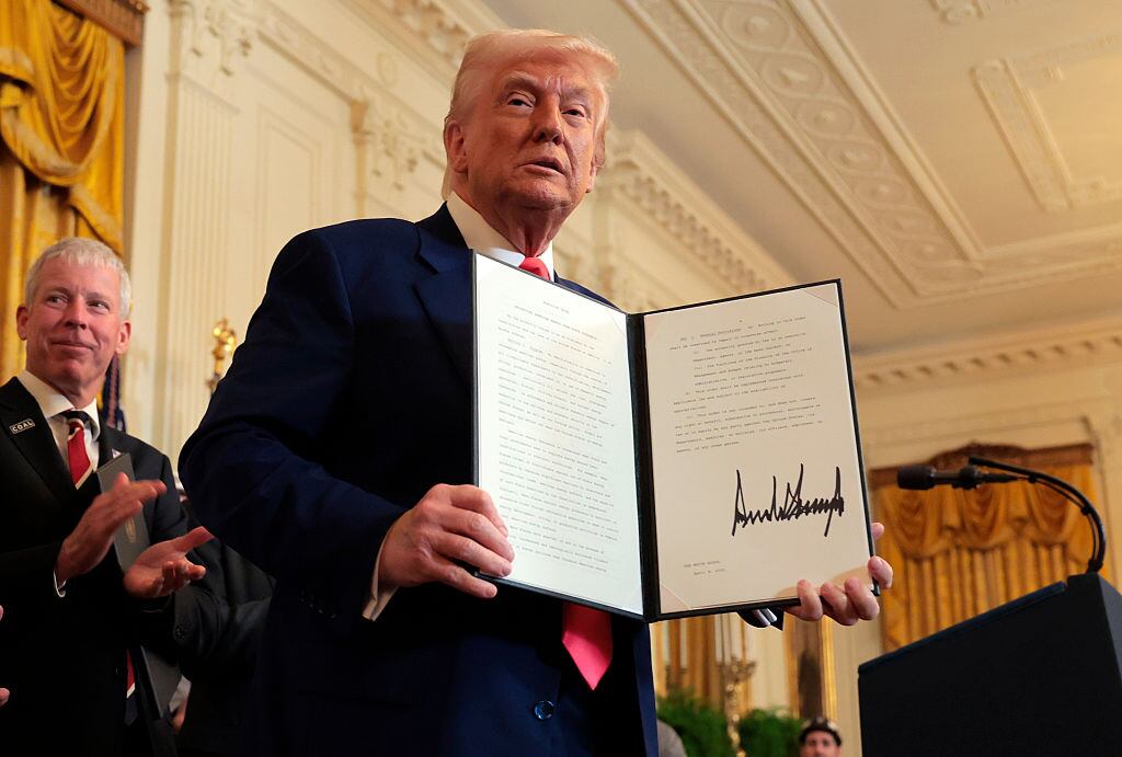WASHINGTON, DC - APRIL 08: U.S. President Donald Trump holds an executive orders after signing a series of orders on American energy production during a ceremony in the East Room of the White House on April 08, 2025 in Washington, DC. The Trump administration has elected to roll back Biden-era environmental policies with the intention to help revive coal-fired plants in order to restore America’s energy independence. Trump was joined by Energy Secretary Chris Wright. (Photo by Anna Moneymaker/Getty Images)