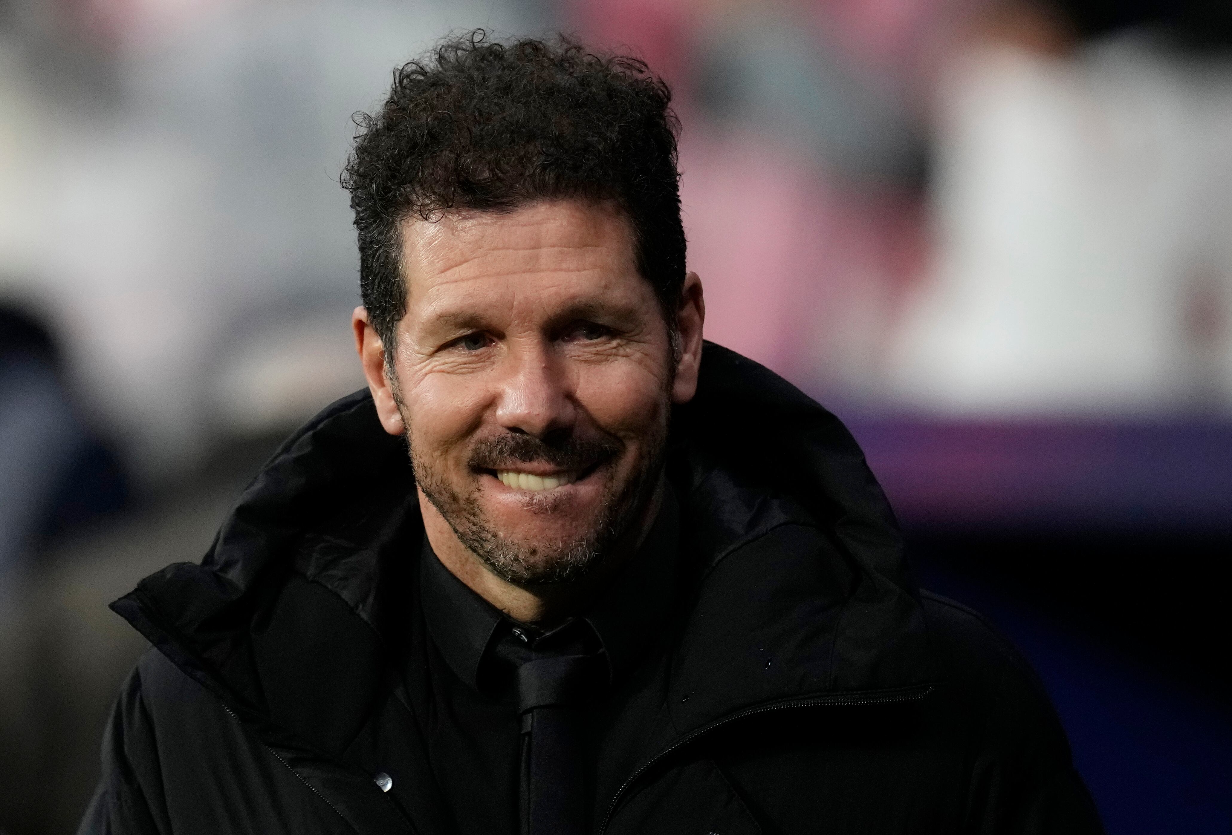 Atletico Madrid's head coach Diego Simeone waits for the start of the Spanish La Liga soccer match between Atletico Madrid and FC Barcelona at Civitas Metropolitano stadium in Madrid, Spain, Sunday, Jan. 8, 2023. (AP Photo/Manu Fernandez)