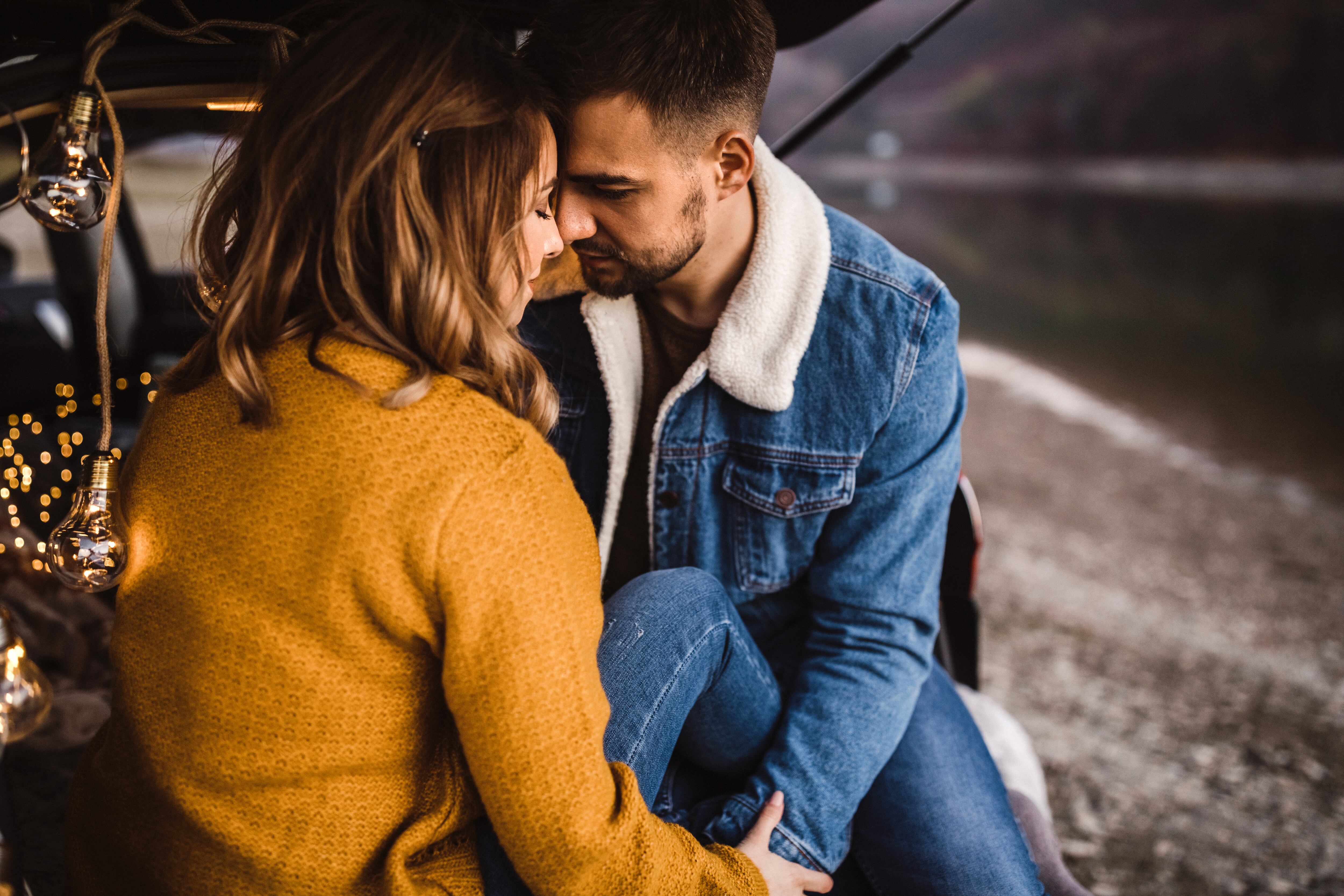 Lovely Couple Having Romantic Day Celebrating Holiday In Camper