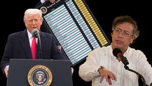 Commerce Secretary Howard Lutnick holds a chart as President Donald Trump speaks during an event to announce new tariffs in the Rose Garden at the White House, Wednesday, April 2, 2025, in Washington. (AP Photo/Mark Schiefelbein)