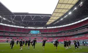 Czech players warm up during a team training session at Wembley stadium in London, Tuesday, June 22, 2021 one day ahead of the Euro 2020 soccer championship group D match against England.(AP Photo/Frank Augstein)