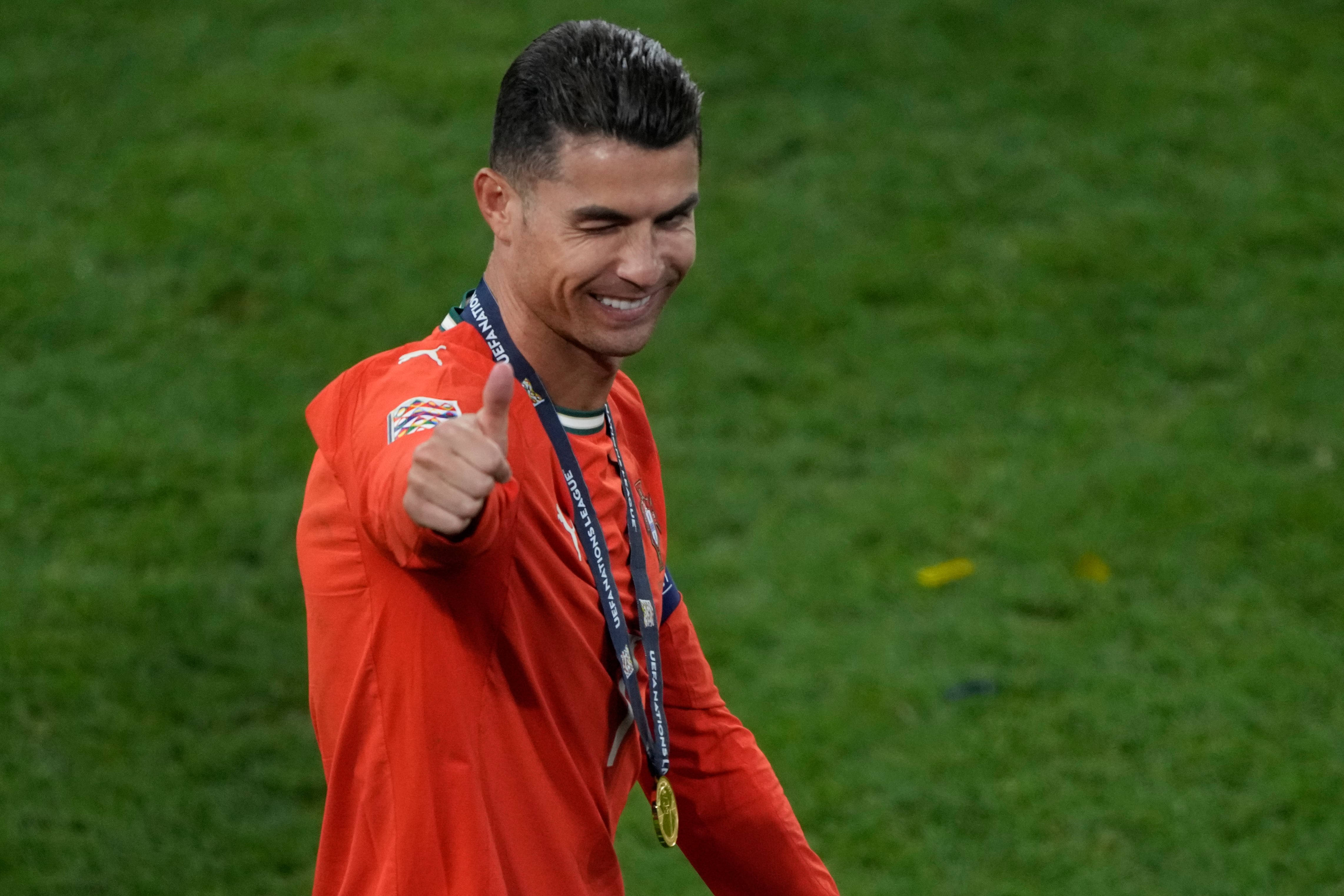 Portugal's Cristiano Ronaldo celebrates after winning the Nations League soccer championship at the Allianz Arena in Munich, Germany, Sunday, June 8, 2025. (AP Photo/Michael Probst)