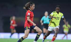 NAVI MUMBAI, INDIA - OCTOBER 12: Sandra Villafane of Spain and Linda Caicedo of Colombia compete for the ball during the FIFA U-17 Women's World Cup 2022 Group C match between Spain and Colombia at DY Patil Stadium on October 12, 2022 in Navi Mumbai, India. (Photo by Joern Pollex - FIFA/FIFA via Getty Images)
