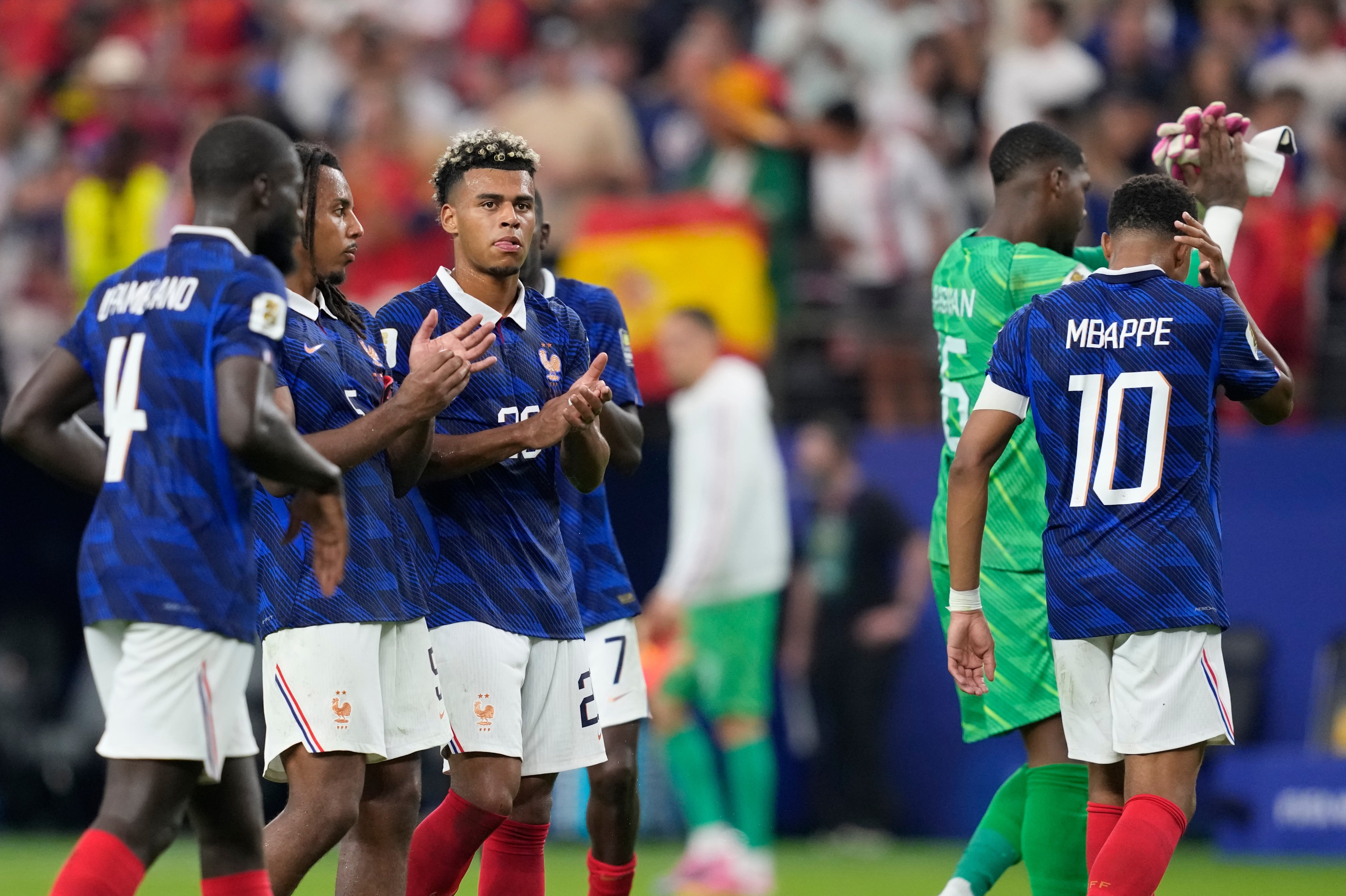 France players applaud after the World Cup semifinal soccer match between France and Spain in Arlington, Texas, near Dallas, Tuesday, July 14, 2026. (AP Photo/Tony Gutierrez)