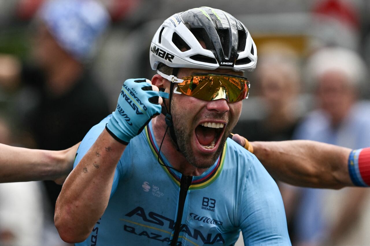 Astana Qazaqstan Team's British rider Mark Cavendish cycles to the finish line to win the 5th stage of the 111th edition of the Tour de France cycling race, 177,5 km between Saint-Jean-de-Maurienne and Saint-Vulbas, on July 3, 2024. (Photo by Marco BERTORELLO / AFP)