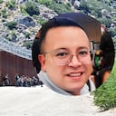 Migrants walk into the US beside the US-Mexico border wall at Jacumba Hot Springs, California, on June 5, 2024. Migrants from countries such as Turkey, Jordan, Guatemala, Nicaragua, China and India made their way on foot into the United States today before being met with by Customs and Border Patrol agents for processing. The United States will temporarily close its Mexico border to asylum seekers from June 5, as President Joe Biden tries to neutralize his political weakness on migration ahead of November's election battle with Donald Trump. (Photo by Frederic J. BROWN / AFP)
