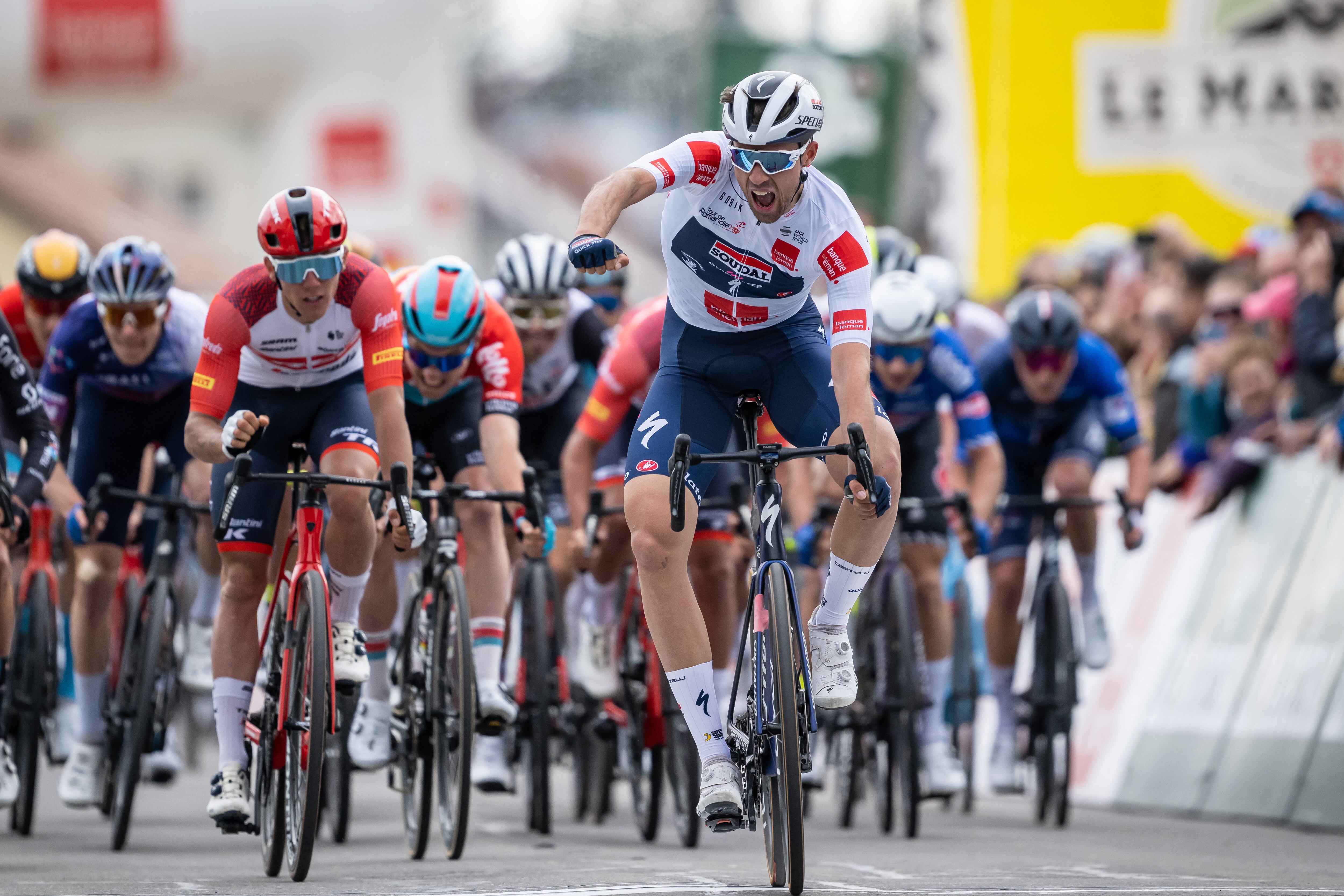 Britain's Ethan Vernon celebrates after winning the first stage of the Tour of Romandie UCI cycling World tour, 170.9 km from Crissier to the Vallee de Joux in the Sentier on April 26, 2023. (Photo by Fabrice COFFRINI / AFP)