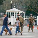 Members of the California National Guard stand watch at the entrance to the state Capitol parking lot in Sacramento, Calif., Sunday, Jan.17, 2021. California Gov. Gavin Newsom mobilized the National Guard over concerns that protests around next week's inauguration of President-elect Joe Biden could turn violent and destructive. (AP Photo/Rich Pedroncelli)