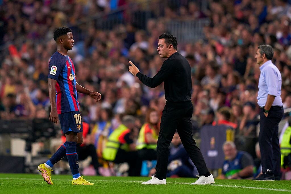 Xavi Hernández y Ansu Fati.