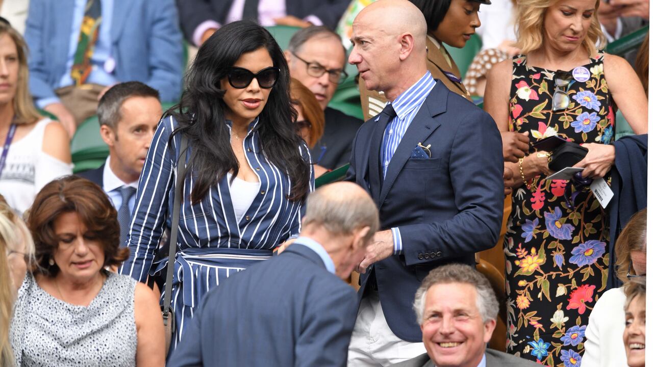 LONDON, ENGLAND - JULY 14: Lauren Sanchez and Jeff Bezos on Centre Court during Men's Finals Day of the Wimbledon Tennis Championships at All England Lawn Tennis and Croquet Club on July 14, 2019 in London, England. (Photo by Karwai Tang/Getty Images)