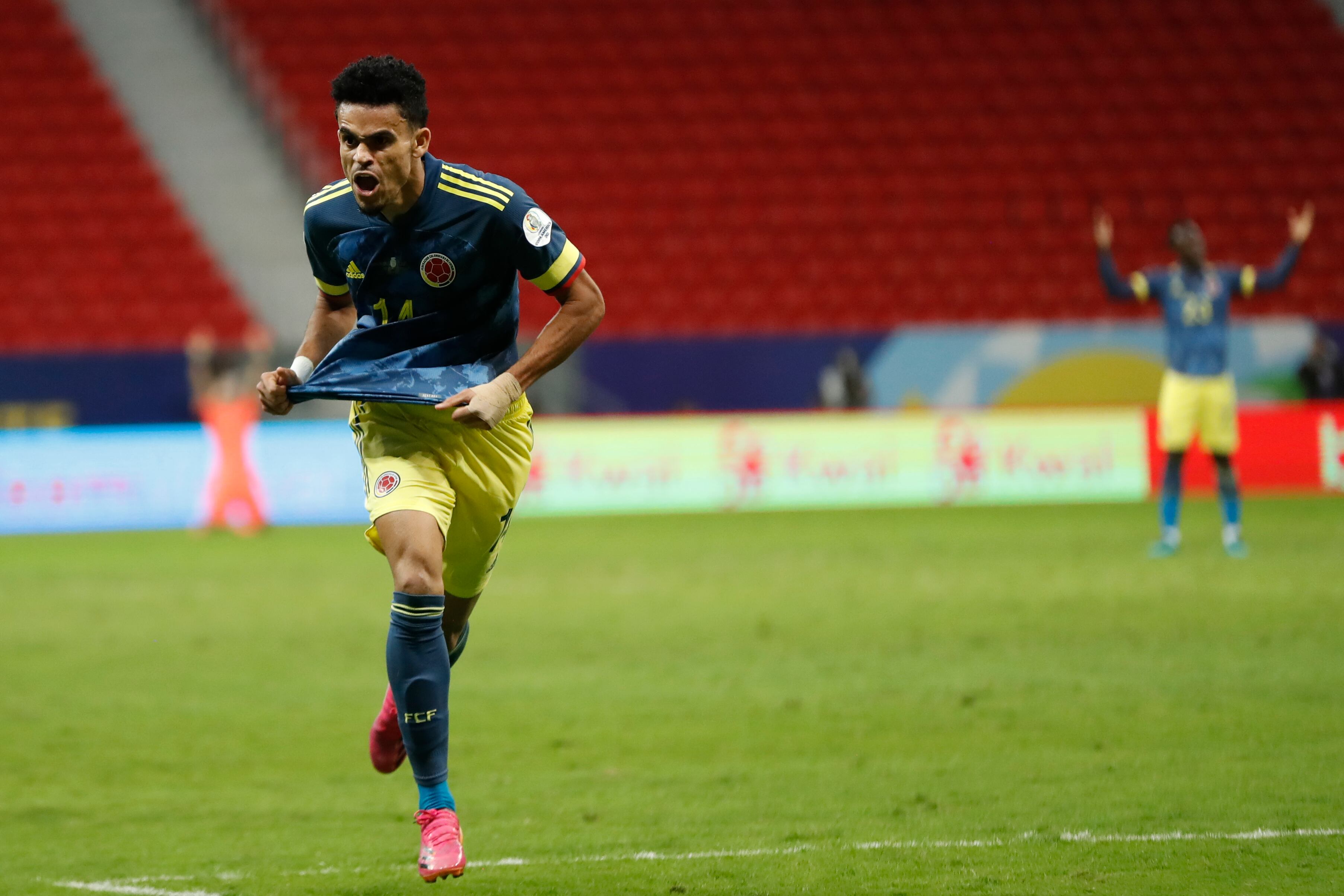 Colombia's Luis Diaz celebrates scoring his side's third goal against Peru during a Copa America third place soccer match at the National stadium in Brasilia, Brazil, Friday, July 9, 2021. (AP Photo/Andre Penner)
