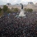Hundreds of people gather on Republique square during a demonstration Sunday Oct. 18, 2020 in Paris. Demonstrations around France have been called in support of freedom of speech and to pay tribute to a French history teacher who was beheaded near Paris after discussing caricatures of Islam's Prophet Muhammad with his class. Samuel Paty was beheaded on Friday by a 18-year-old Moscow-born Chechen refugee who was shot dead by police. (AP Photo/Michel Euler)