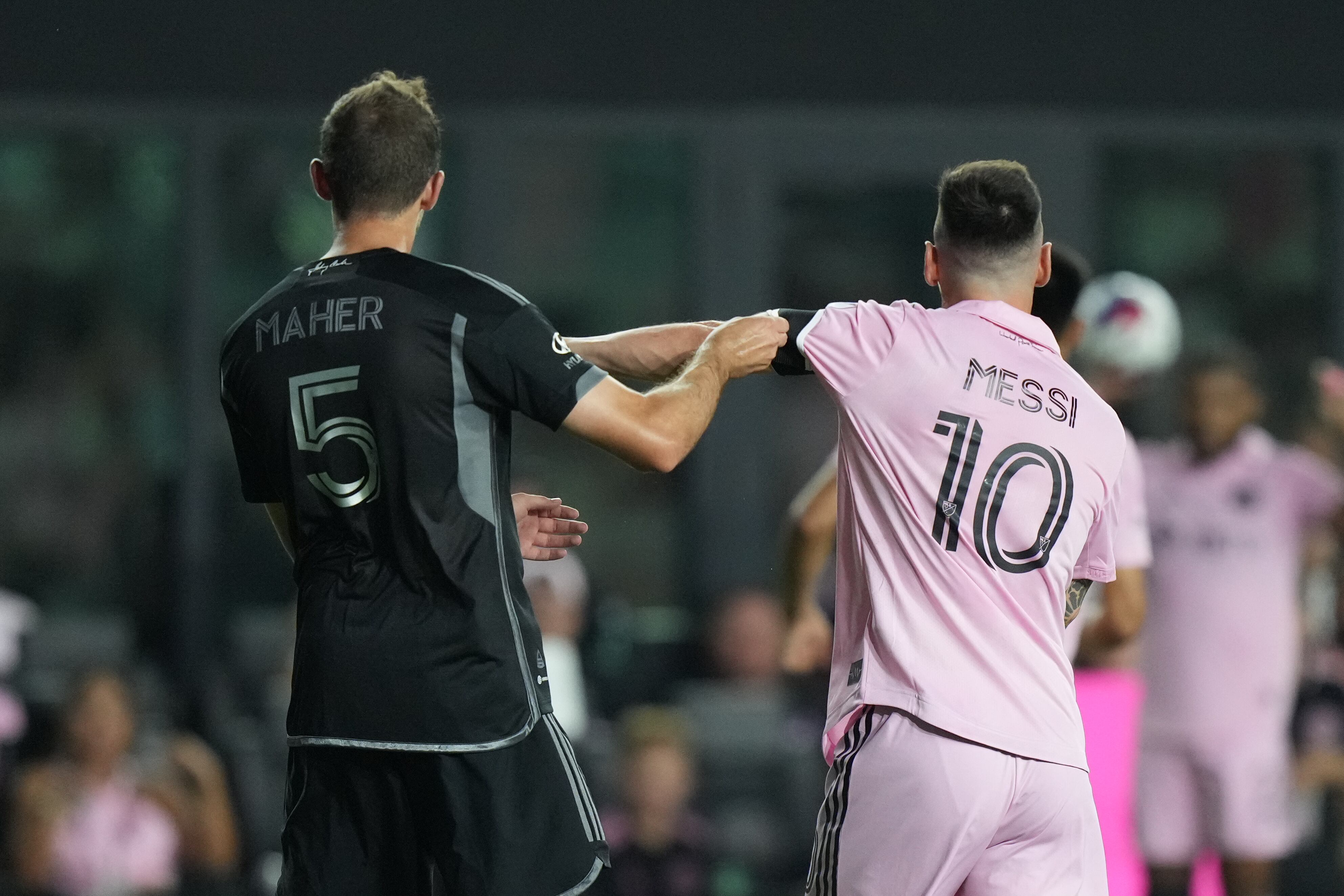 FORT LAUDERDALE, FL - AUGUST 30: Inter Miami forward Lionel Messi (10) pushes Nashville SC defender Jack Maher (5) after Maher continues to grab Messi drawing a warning from the official during the game between Nashville SC and Inter Miami on Wednesday, August 30, 2023, DRV PNK Stadium, Fort Lauderdale, Fla. (Photo by Peter Joneleit/Icon Sportswire via Getty Images)
