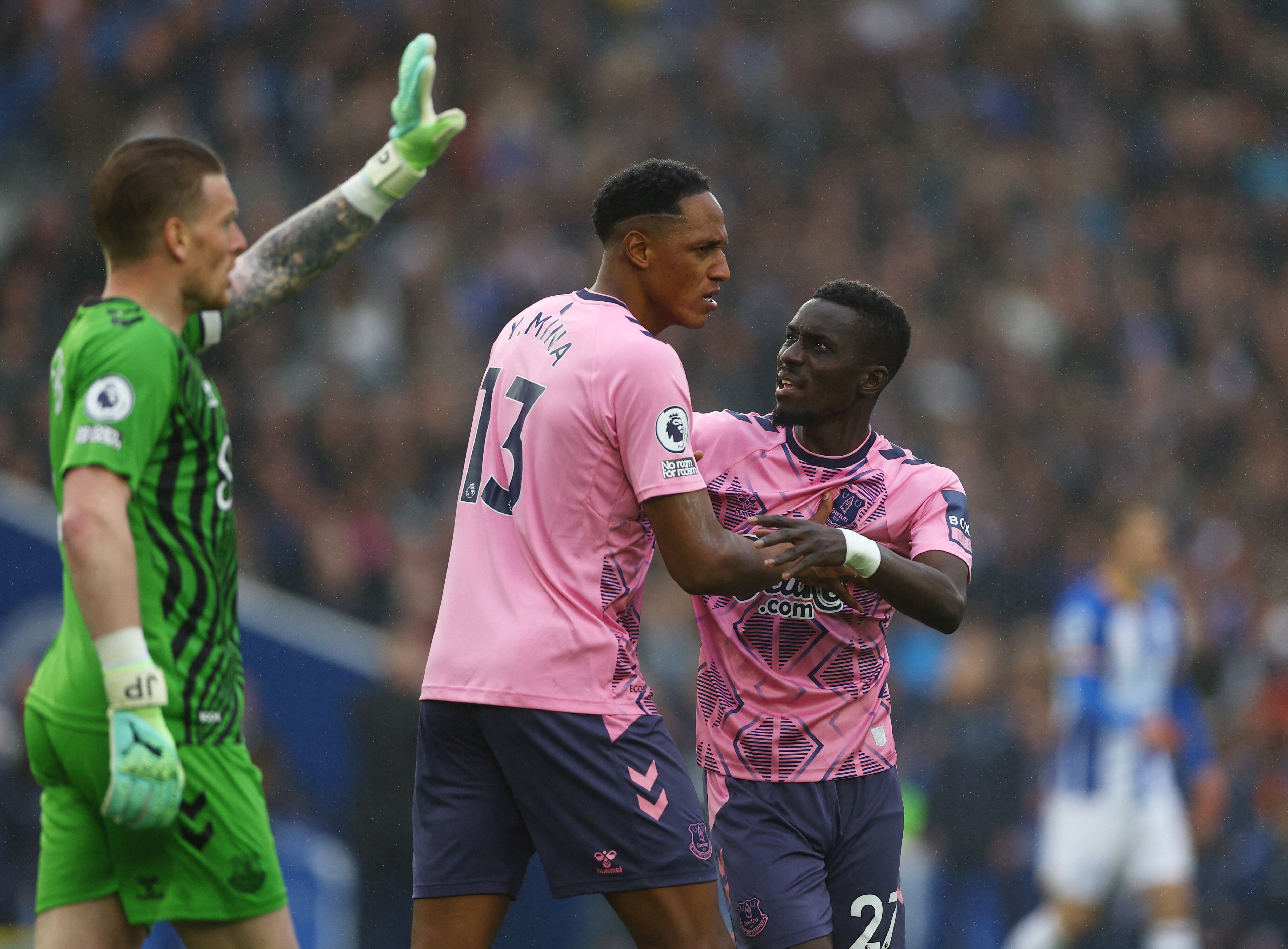 Soccer Football - Premier League - Brighton & Hove Albion v Everton - The American Express Community Stadium, Brighton, Britain - May 8, 2023  Everton's Yerry Mina and Idrissa Gueye react Action Images via Reuters/Matthew Childs EDITORIAL USE ONLY. No use with unauthorized audio, video, data, fixture lists, club/league logos or 'live' services. Online in-match use limited to 75 images, no video emulation. No use in betting, games or single club /league/player publications.  Please contact your account representative for further details
