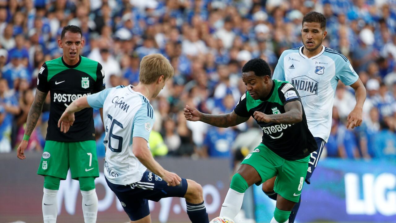 BOGOTA, COLOMBIA - AUGUST 27: Andres Llinas (L) of Millonarios fights for the ball against Dorlan Pabon of Nacional during a liga BetPlay match between Millonarios and Nacional at El Campin stadium on August 27, 2023 in Bogota, Colombia. (Photo by John Vizcaino/VIEWpress)
