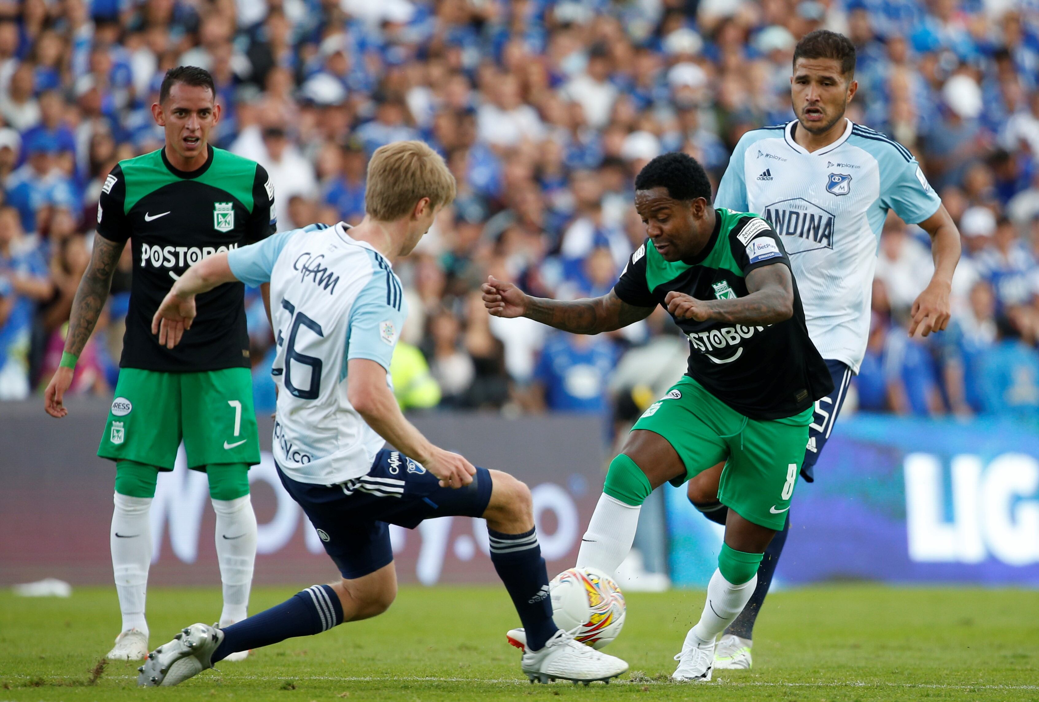 BOGOTA, COLOMBIA - AUGUST 27: Andres Llinas (L) of Millonarios fights for the ball against Dorlan Pabon of Nacional during a liga BetPlay match between Millonarios and Nacional at El Campin stadium on August 27, 2023 in Bogota, Colombia. (Photo by John Vizcaino/VIEWpress)