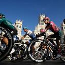 MADRID, SPAIN - SEPTEMBER 11: (L-R) Christopher Froome of United Kingdom and Team Israel - Premier Tech, Rigoberto Uran Uran of Colombia and Team EF Education - Easypost and a general view of the peloton competing passing through the Plaza Cibeles with the Palacio de Cibeles - Ayuntamiento de Madrid in the background during the 77th Tour of Spain 2022, Stage 21 a 96,7km stage from Las Rozas to Madrid / #LaVuelta22 / #WorldTour / on September 11, 2022 in Madrid, Spain. (Photo by Justin Setterfield/Getty Images)