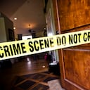 Crime Scene tape at the front door of a luxury home