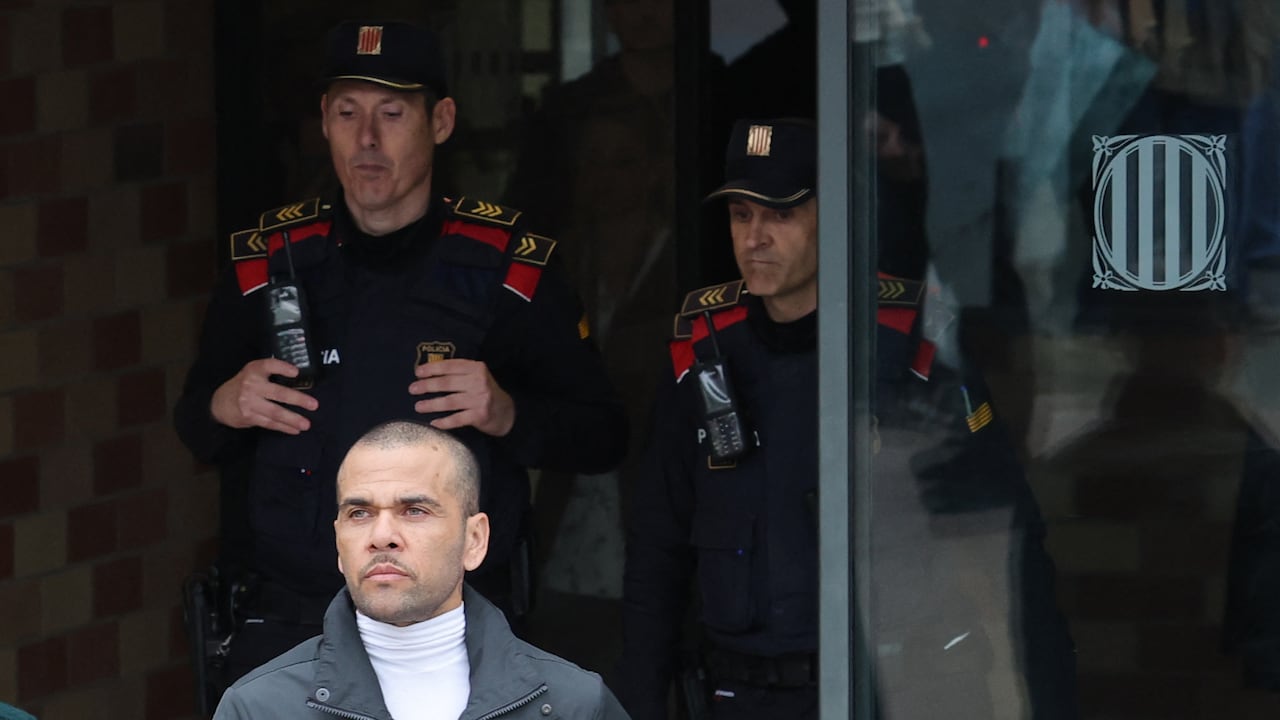 Convicted rapist and former Brazil international football player Dani Alves leaves on provisional release after posting one-million-euro bail, at Brians 2 prison in San Esteban Sasroviras, near Barcelona, on March 25, 2024. Convicted rapist and former Brazil international Dani Alves left a jail in Barcelona on March 25, 2024 after posting the one-million-euro bail set by a Barcelona court to ensure his release pending appeal. Ex-Brazil star has been sentenced to 4.5 years in jail for rape on February 22, 2024. (Photo by LLUIS GENE / AFP)