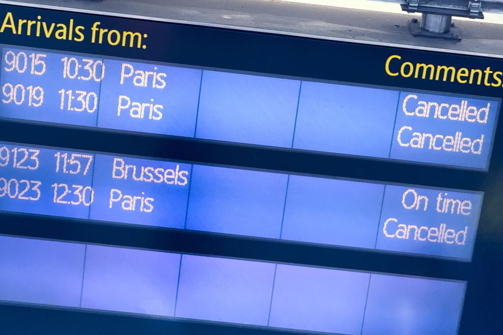 A screen shows Eurostar train cancellations at St Pancras Station in London, England, on March 7, 2025, as trains to and from Paris are cancelled for the day due to an unexploded WWII bomb found at Gare Du Nord. (Photo by Alberto Pezzali/NurPhoto via Getty Images)