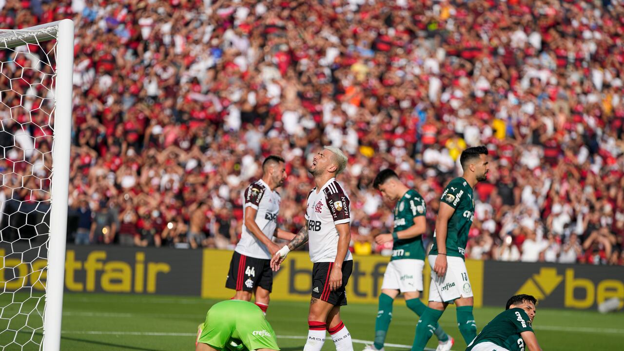 Giorgian De Arrascaeta of Brazil's Flamengo reacts after goalkeeper Weverton of Brazil's Palmeiras blocked a shot during the Copa Libertadores final soccer match in Montevideo, Uruguay, Saturday, Nov. 27, 2021. (AP Photo/Natacha Pisarenko)