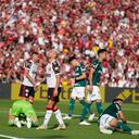 Giorgian De Arrascaeta of Brazil's Flamengo reacts after goalkeeper Weverton of Brazil's Palmeiras blocked a shot during the Copa Libertadores final soccer match in Montevideo, Uruguay, Saturday, Nov. 27, 2021. (AP Photo/Natacha Pisarenko)