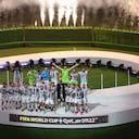 Soccer Football - FIFA World Cup Qatar 2022 - Final - Argentina v France - Lusail Stadium, Lusail, Qatar - December 18, 2022 Argentina's Lionel Messi celebrates with the trophy after winning the World Cup REUTERS/Paul Childs