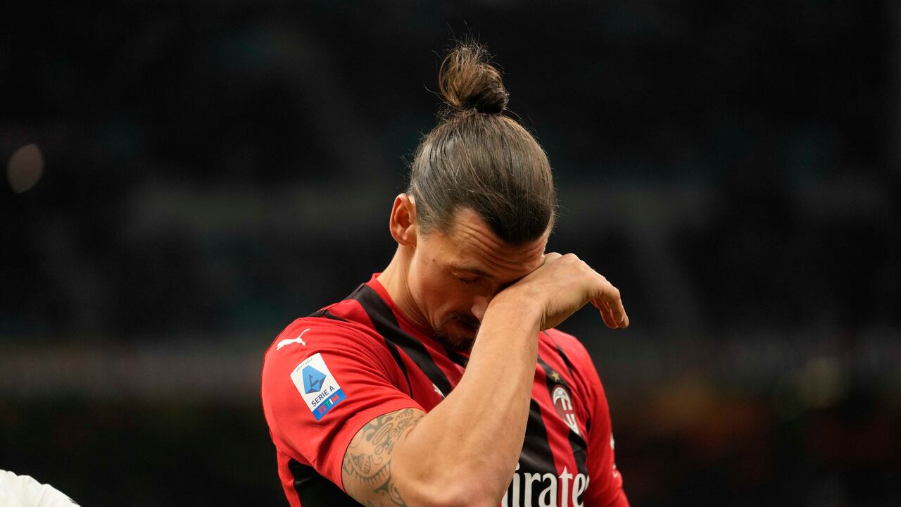 AC Milan's Zlatan Ibrahimovic gestures during a Serie A soccer match between AC Milan and Sassuolo, at the San Siro stadium in Milan, Italy, Sunday, Nov. 28, 2021. (AP Photo/Luca Bruno)