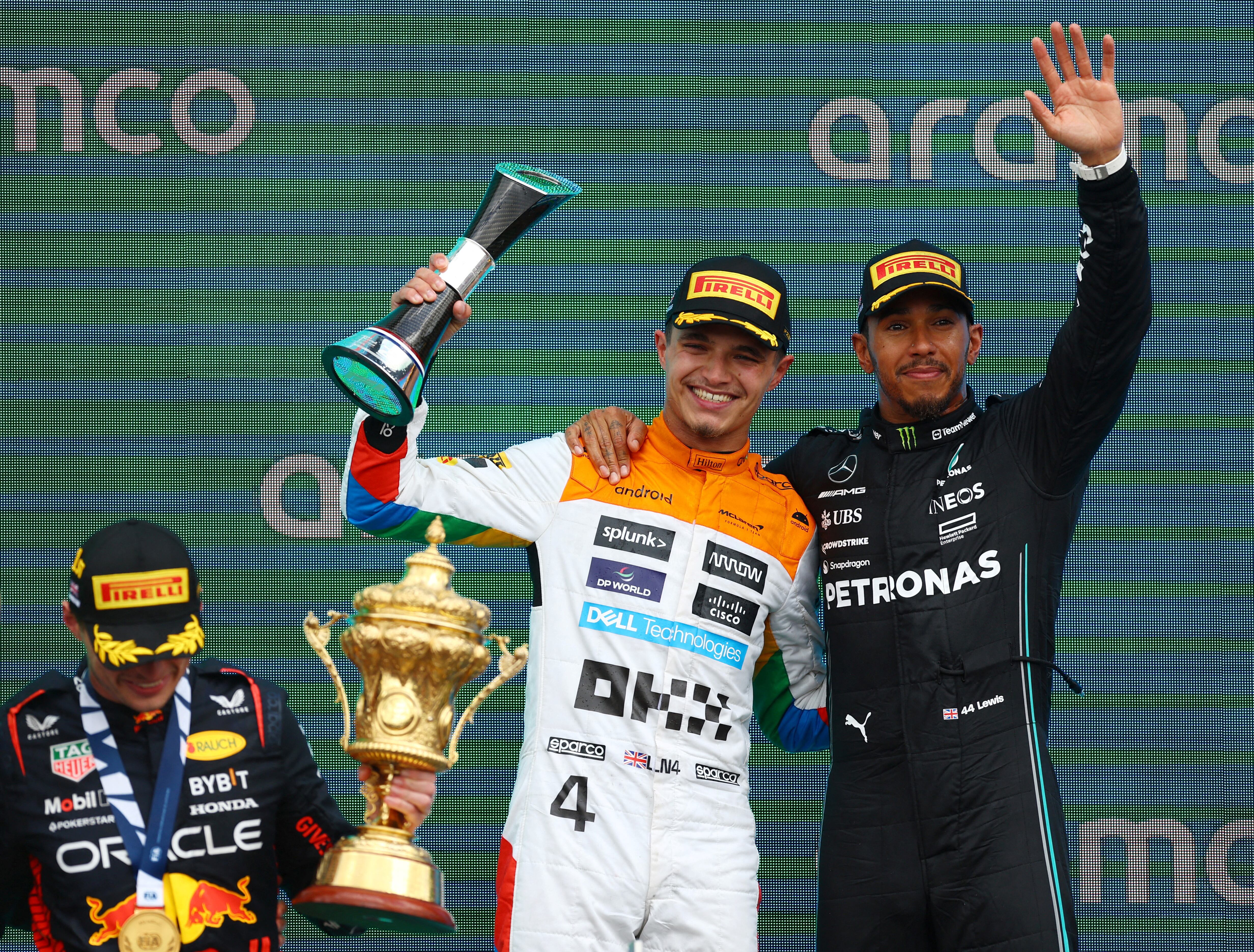 Formula One F1 - British Grand Prix - Silverstone Circuit, Silverstone, Britain - July 9, 2023 Red Bull's Max Verstappen celebrates on the podium after winning the race alongside second placed McLaren's Lando Norris and third placed Mercedes' Lewis Hamilton REUTERS/Molly Darlington     TPX IMAGES OF THE DAY