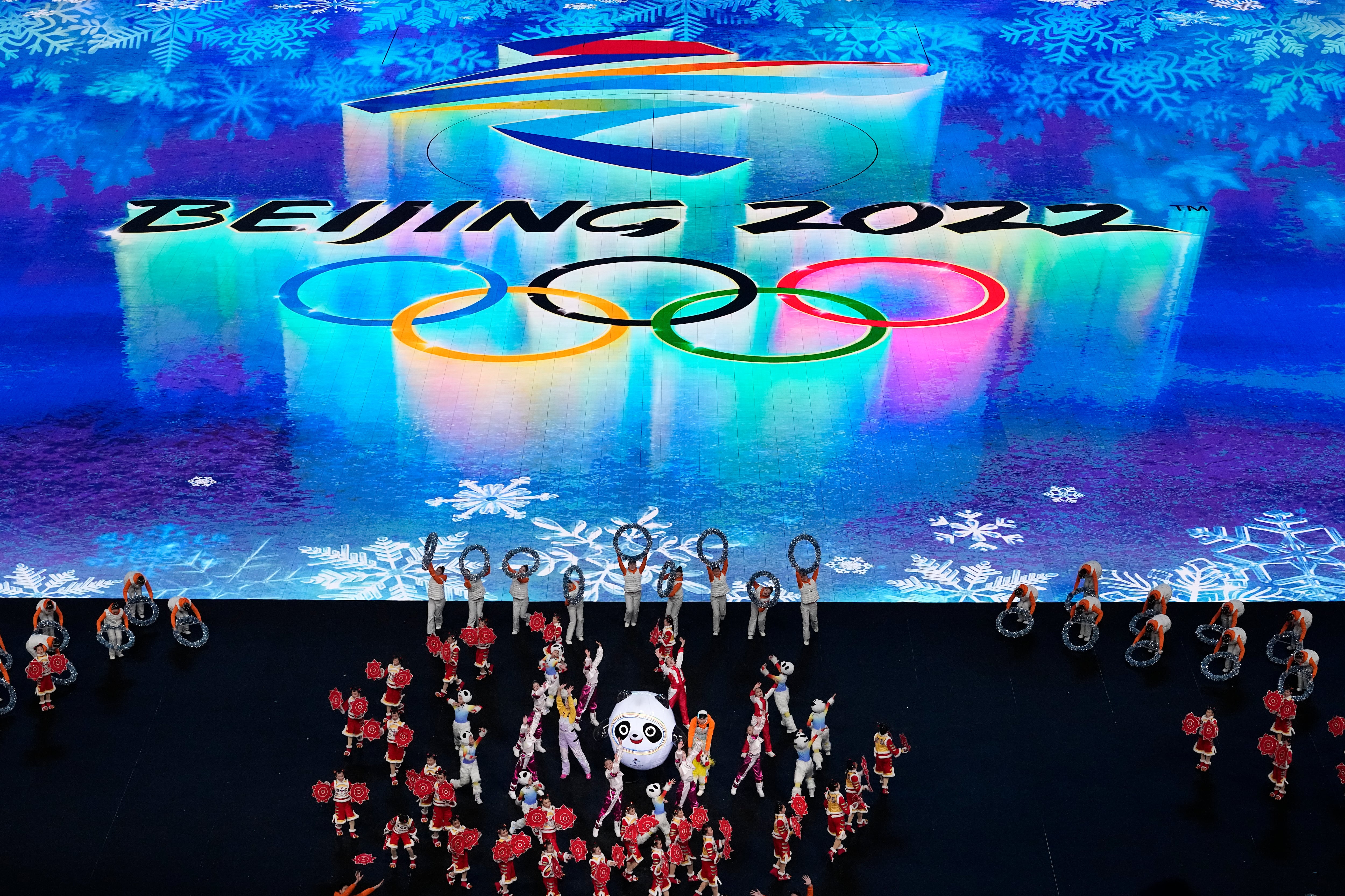 Performers dance in the pre-show during the opening ceremony of the 2022 Winter Olympics, Friday, Feb. 4, 2022, in Beijing. (AP Photo/Ashley Landis)