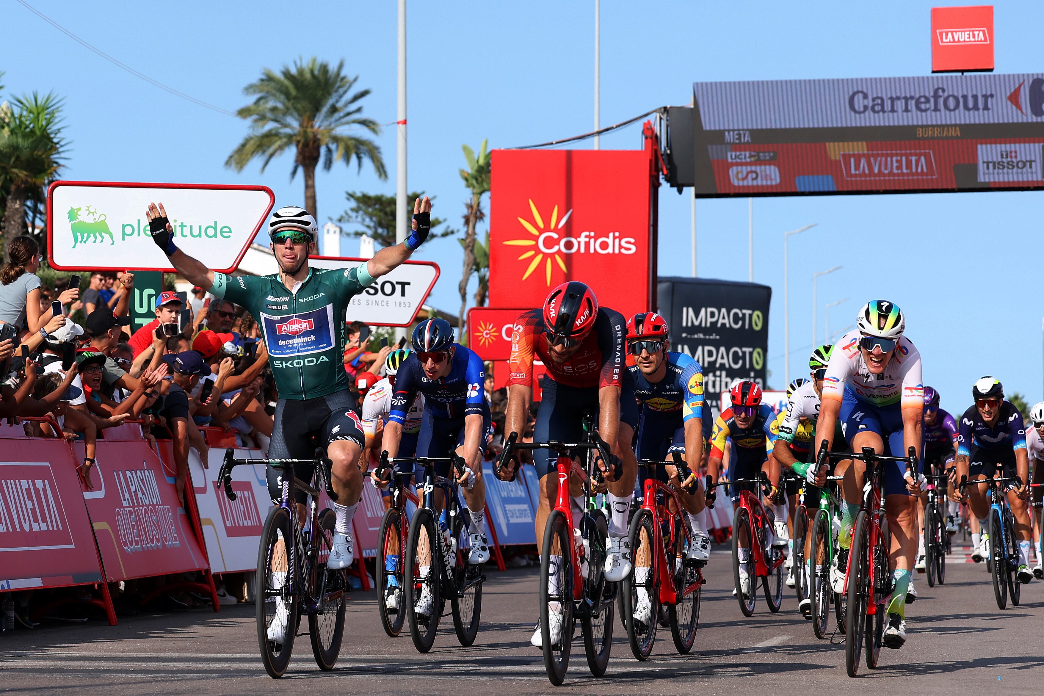 BURRIANA, SPAIN - AUGUST 30: Kaden Groves of Australia and Team Alpecin-Deceuninck celebrates at finish line as stage winner ahead of Filippo Ganna of Italy and Team INEOS Grenadiers, Lewis Askey of The United Kingdom and Team Groupama - FDJ, Edward Theuns of Belgium and Team Lidl - Trek and Dries Van Gestel of Belgium and Team TotalEnergies during the 78th Tour of Spain 2023, Stage 5 a 184.6km stage from Burriana to Burriana / #UCIWT / on August 30, 2023 in Morella, Spain. (Photo by Alexander Hassenstein/Getty Images)
