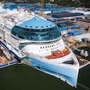 An aerial view taken on May 30, 2023 shows the construction site of the Royal Caribbean's new ship 'Icon of the Seas' at the Turku shipyard in Finland's southwest coast. With cruise bookings seeing a resurgence after the Covid pandemic saw luxury liners mothballed, a Finnish shipyard is putting the final touches on what will be the world's largest cruise ship. Royal Caribbean's luxurious new vessel Icon of the Seas is nearing completion in the Turku shipyard on Finland's southwestern coast, its maiden voyage scheduled for January 2024. (Photo by Jonathan NACKSTRAND / AFP)