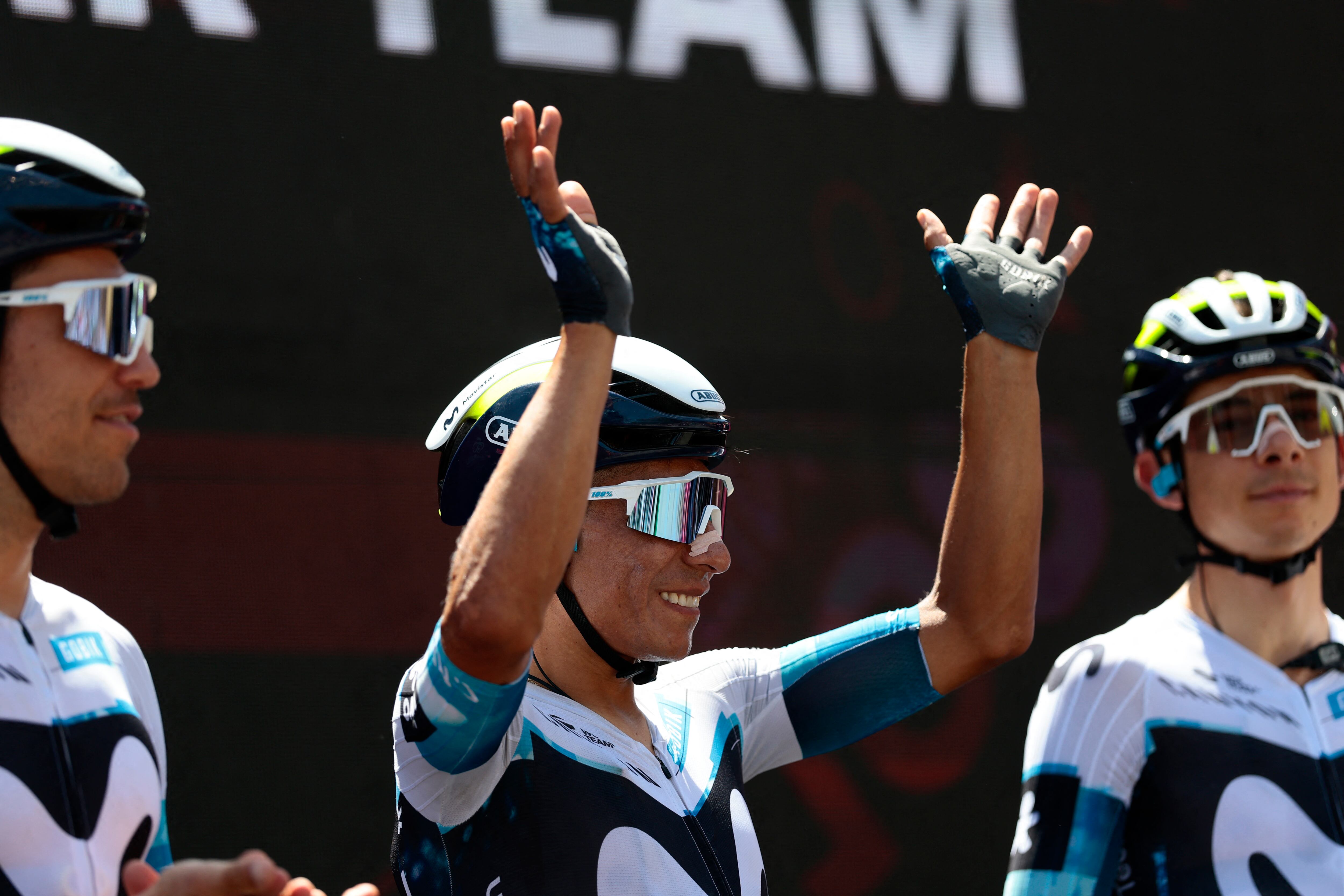 Movistar Team's Colombian rider Nairo Quintana waves before the start of the 18th stage of the 108th Giro d'Italia cycling race of 144kms from Morbegno to Cesano Maderno on May 29, 2025. (Photo by Luca Bettini / AFP)
