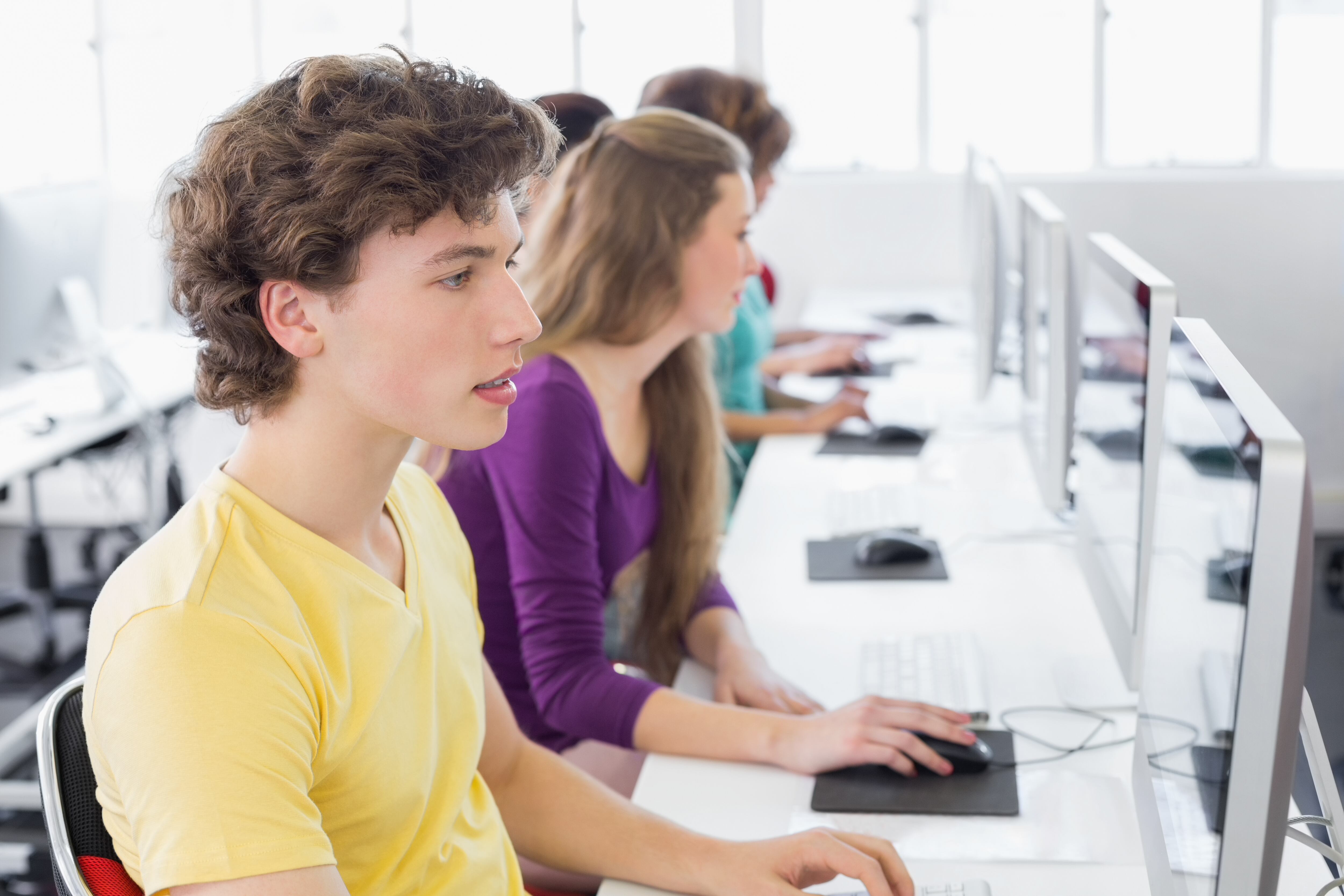 Students working in computer room at the college