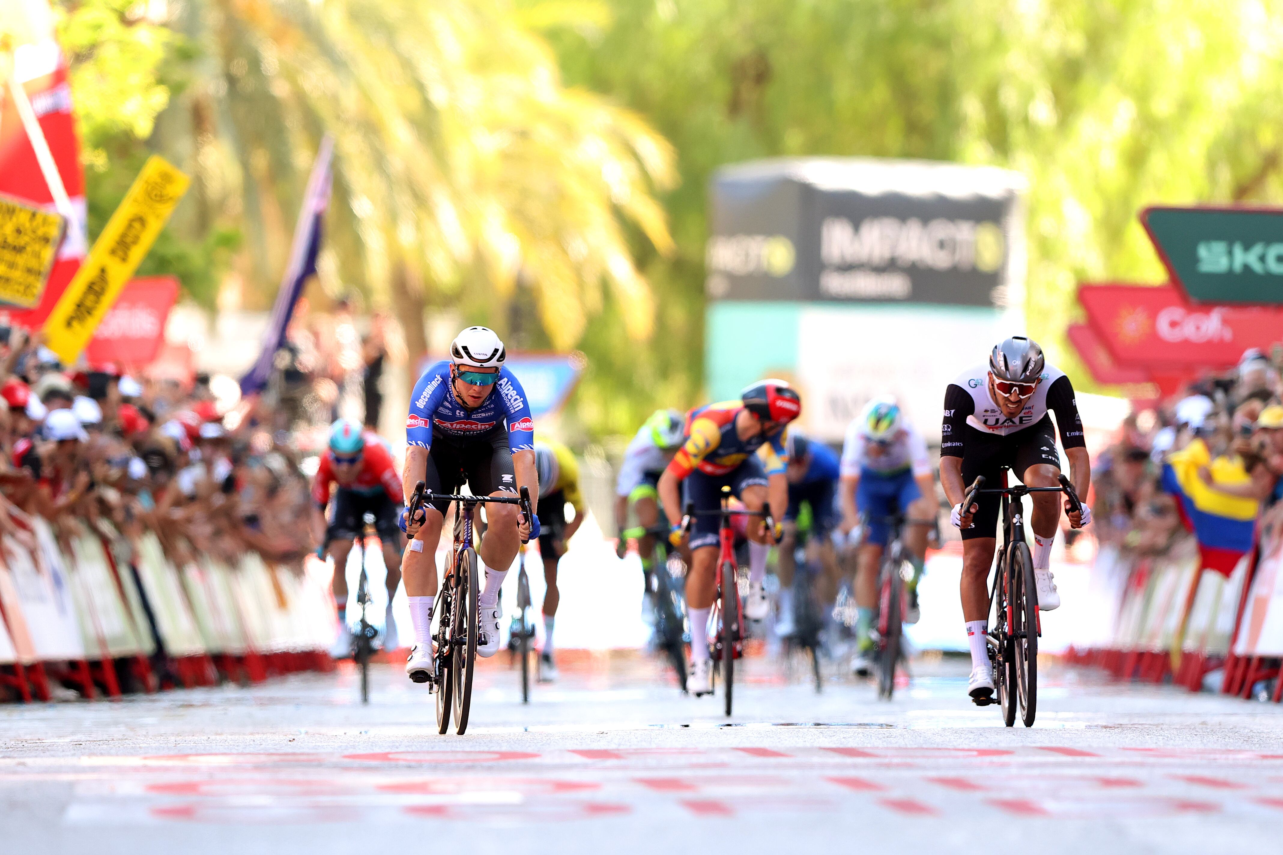 TARRAGONA, SPAIN - AUGUST 29: (L-R) Kaden Groves of Australia and Team Alpecin-Deceuninck and Juan Sebastian Molano Benavides of Colombia and UAE Team Emirates sprint at finish line to win during the 78th Tour of Spain 2023, Stage 4 a 184.6km stage from Andorra la Vella to Tarragona / #UCIWT / on August 29, 2023 in Tarragona, Spain. (Photo by Alexander Hassenstein/Getty Images)