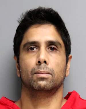 FILE - This undated photo provided by the San Mateo County Sheriff's Office shows Dharmesh Patel. The wife of Patel, a California radiologist accused of trying to kill his family when he drove his Tesla off a cliff along the Northern California coast told rescuers her husband was depressed and needed a psychological evaluation, according to a newly unsealed search warrant affidavit. (San Mateo County Sheriff's Office via AP, File)