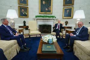Speaker of the House Kevin McCarthy of Calif., left, and Senate Majority Leader Sen. Chuck Schumer of N.Y., right, listen as President Joe Biden before a meeting on the debt limit in the Oval Office of the White House, Tuesday, May 9, 2023, in Washington. (AP Photo/Evan Vucci)
