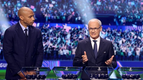UEFA Deputy General Secretary Giorgio Marchetti (R) speaks next to French former football player Thierry Henry during the draw ceremony for the league phase of the 2026-2027 UEFA Champions League football tournament at the Grimaldi Forum in the Principality of Monaco on August 27, 2026. (Photo by Valery HACHE / AFP)