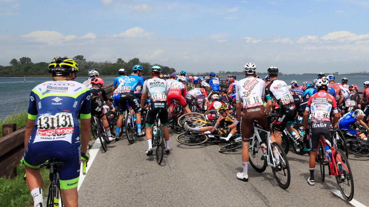 Riders fall during a massive crash into the pack during the 15th stage of the Giro d'Italia 2021 cycling race, a 147km race between Grado and Gorizia on May 23, 2021.
Luca Bettini / AFP