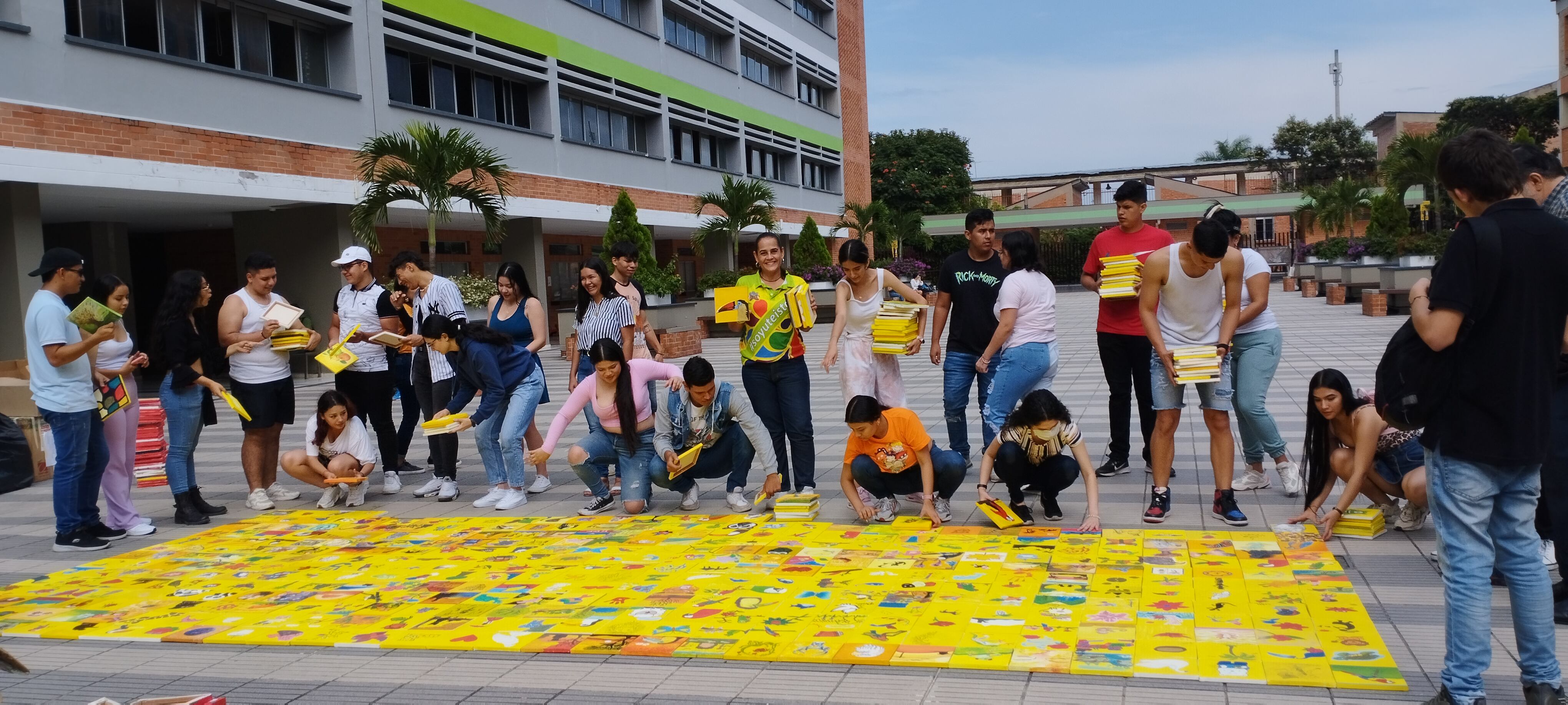 Docente y estudiantes de las UTS ensamblaron la bandera mosaico por la paz.