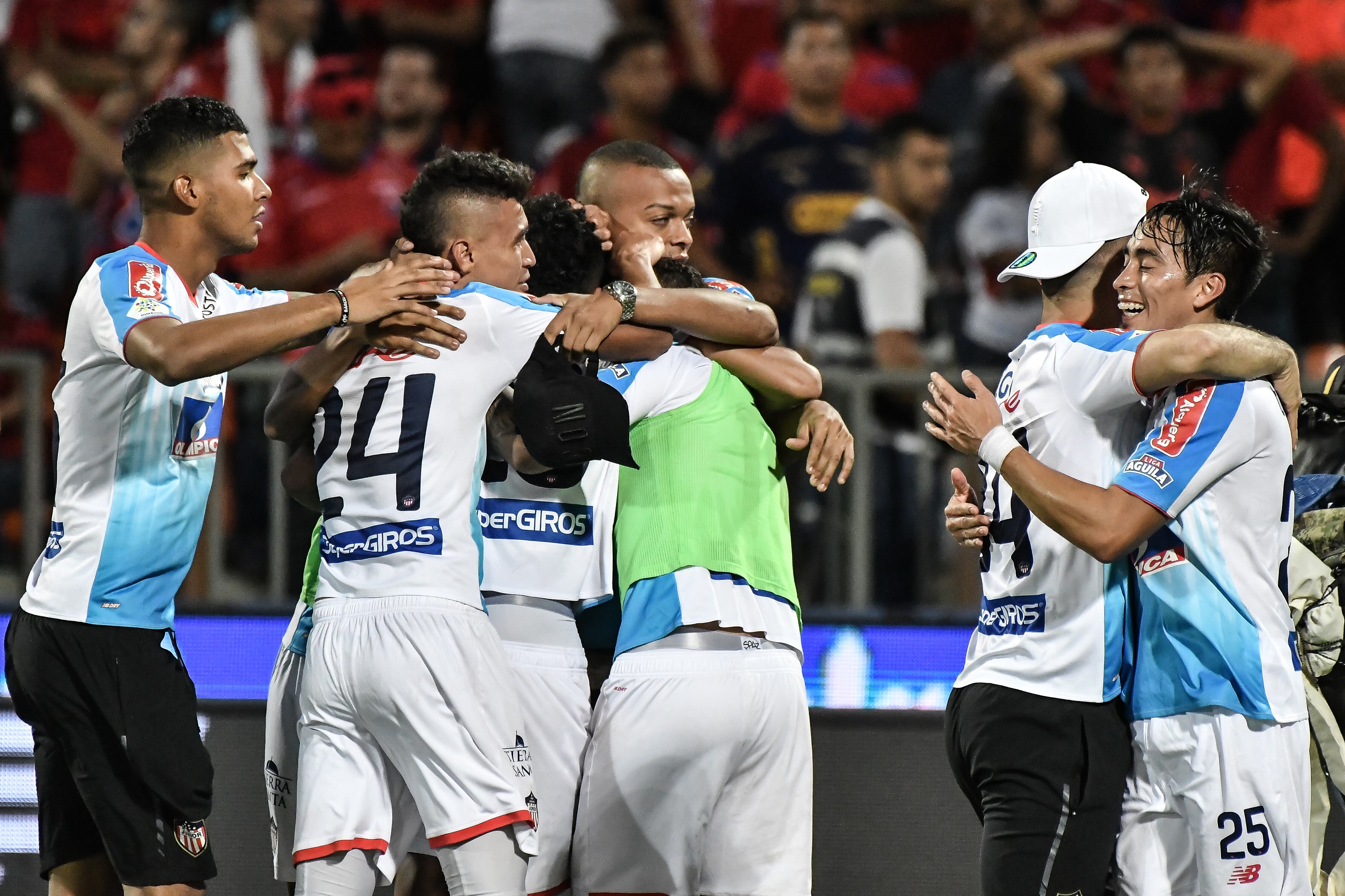 MEDELLIN, COLOMBIA - DECEMBER 16: Victor Cantillo and Fabian Sambueza of Junior celebrate the championship after the second leg final match of the Torneo Clausura Liga Aguila 2018 between Independiente Medellin and Junior at Estadio Atanasio Girardot on December 16, 2018 in Medellin, Colombia. (Photo by