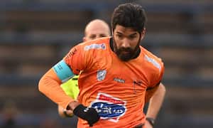 Uruguay's Sud America coach and player Sebastian Abreu, kicks the ball during the last match of his career, against Liverpool, in Montevideo on June 11, 2021.
PABLO PORCIUNCULA / AFP