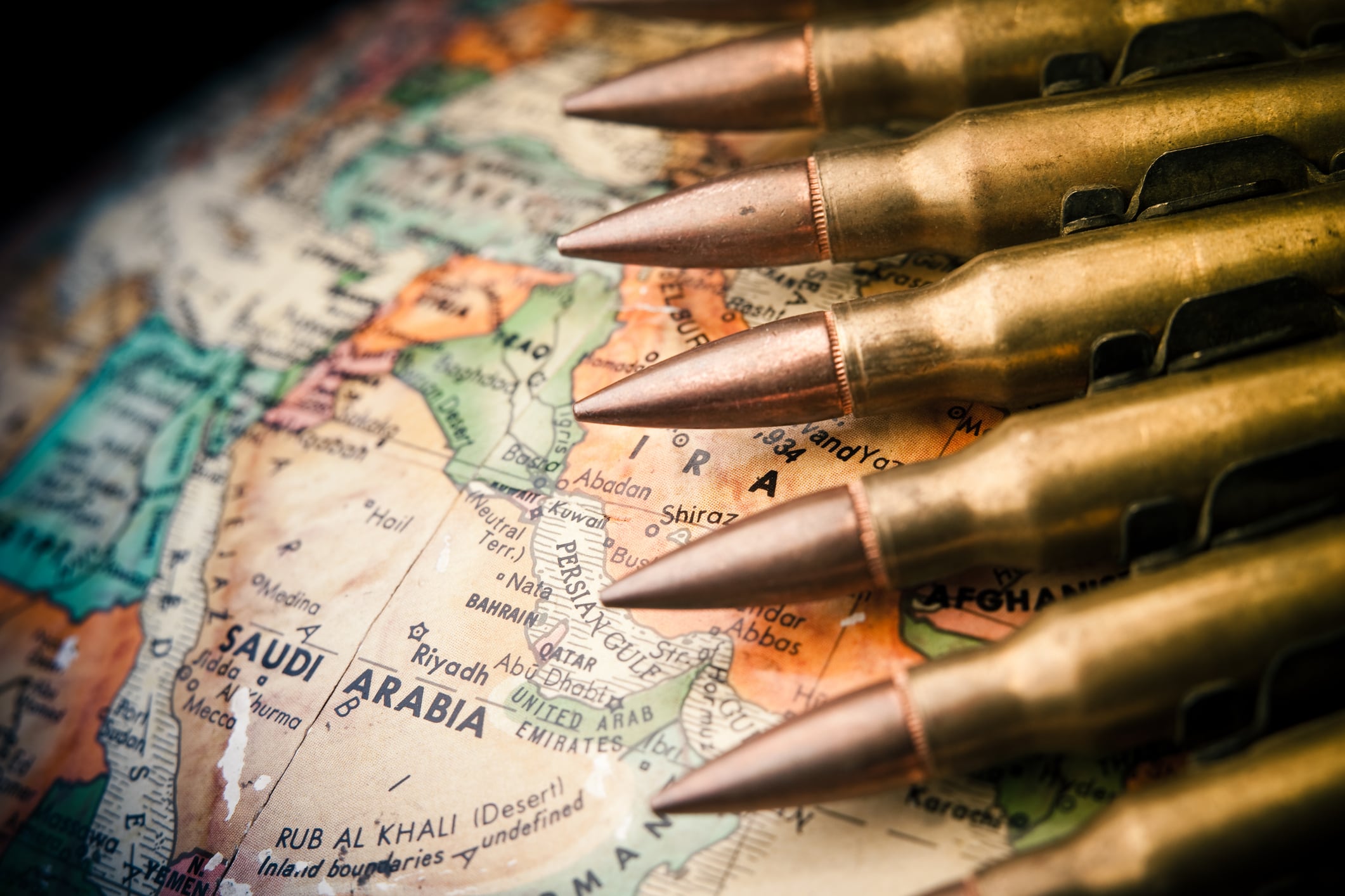 Map of the Middle East with Saudi Arabia in focus with bullets draped across