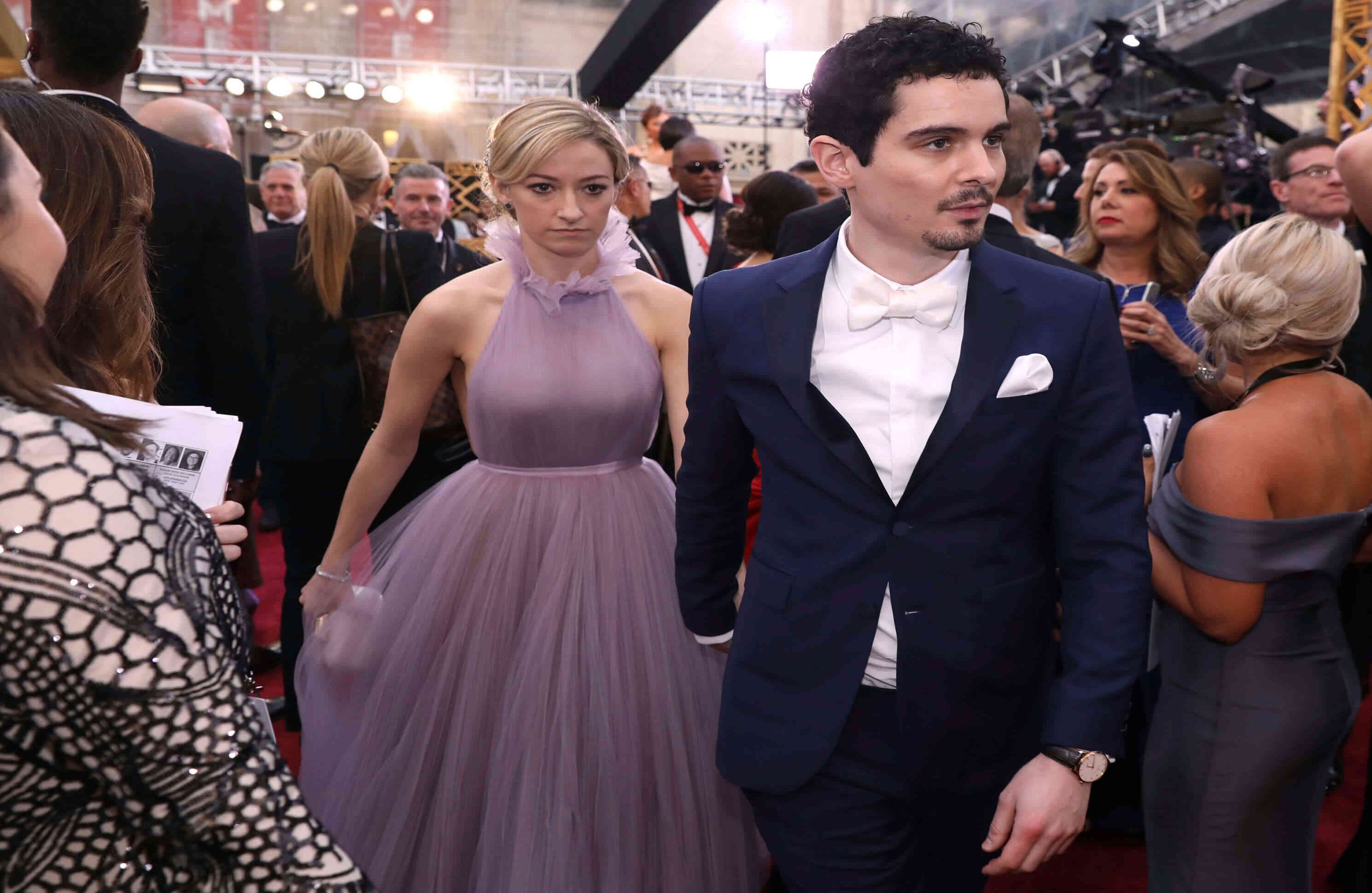 Damien Chazelle y Olivia Hamilton. El joven director a pesar de no llevarse el premio a mejor película, La La Land se llevó seis estatuillas (Photo by Matt Sayles/Invision/AP)