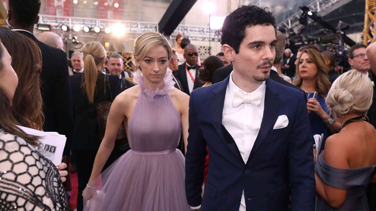 Damien Chazelle y Olivia Hamilton. (Photo by Matt Sayles/Invision/AP)