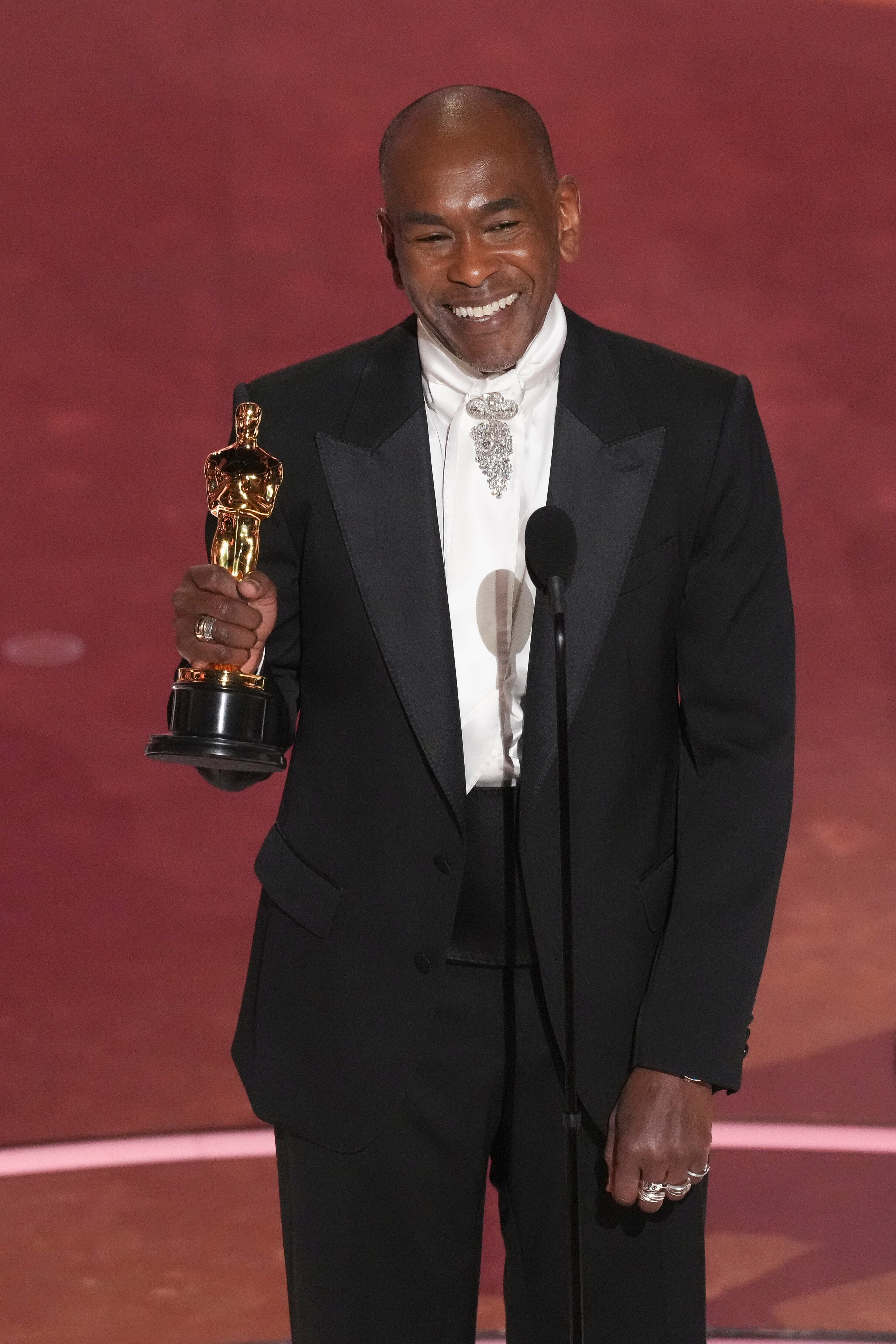 Paul Tazewell accepts the award for best costume design for "Wicked" during the Oscars on Sunday, March 2, 2025, at the Dolby Theatre in Los Angeles. (AP Photo/Chris Pizzello)