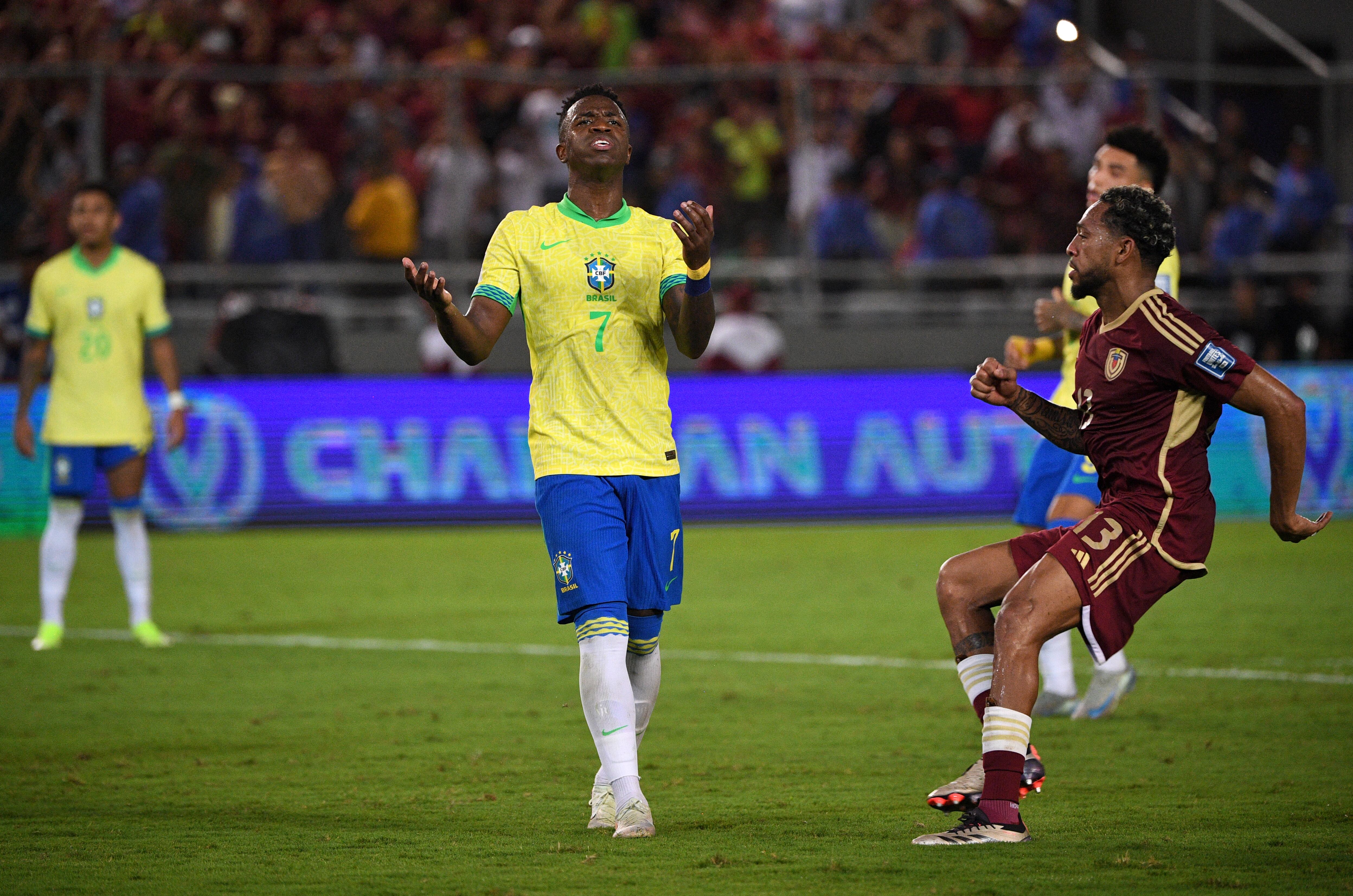 Brazil's forward #07 Vinicius Jr reacts after missing a penalty kick during the 2026 FIFA World Cup South American qualifiers football match between Venezuela and Brazil at the Monumental stadium in Maturin, Monagas State, Venezuela, on November 14, 2024. (Photo by Federico Parra / AFP)