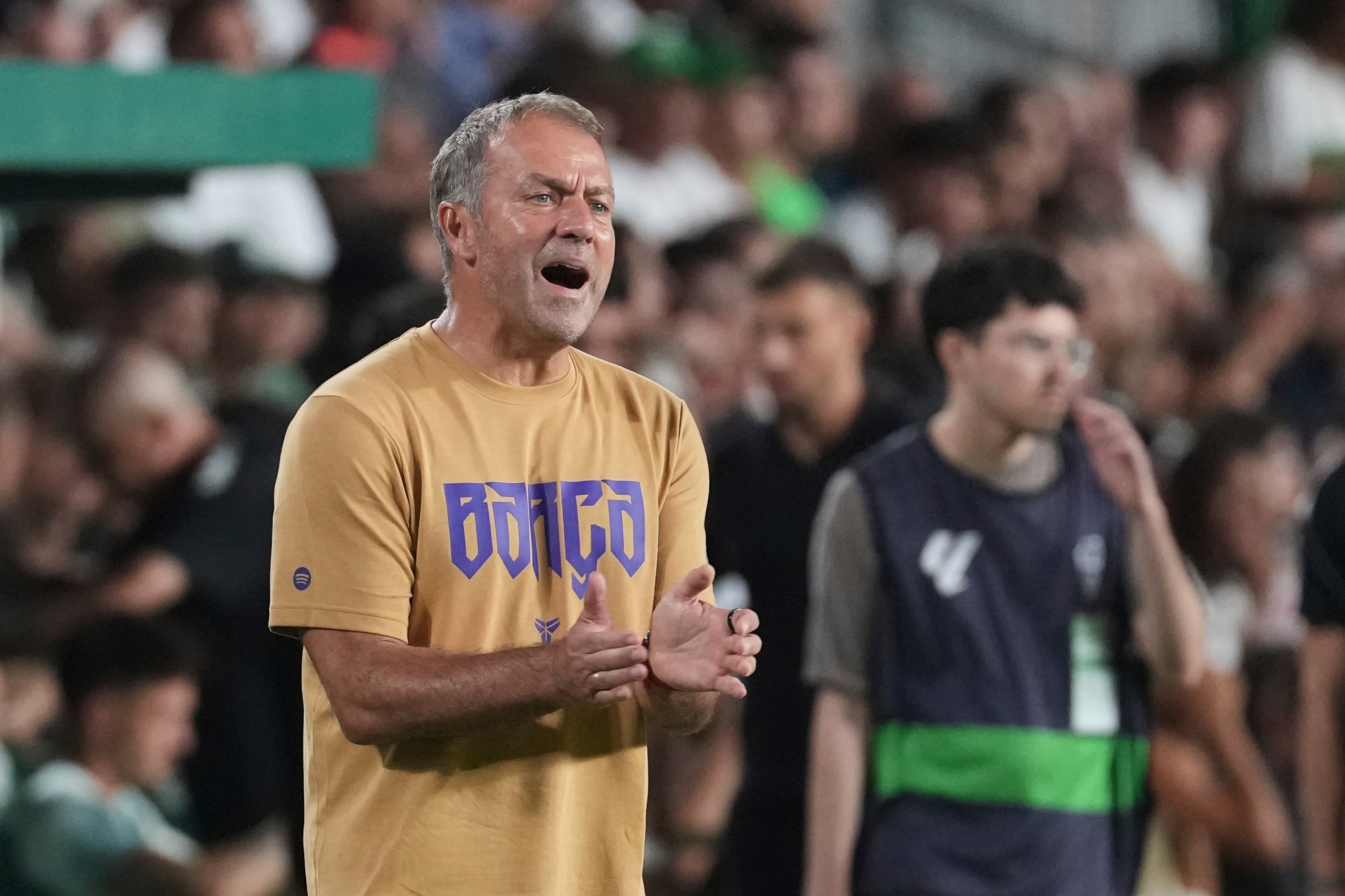 Barcelona's head coach Hansi Flick reacts during a Spanish La Liga soccer match between Elche and Barcelona in Elche, Spain, Sunday, Aug. 23, 2026. (AP Photo/Alberto Saiz)
